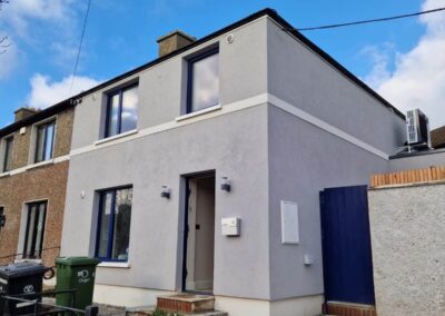 Completed house extension and exterior renovation with fresh render and modern finishes in Dublin by Glanmore Construction